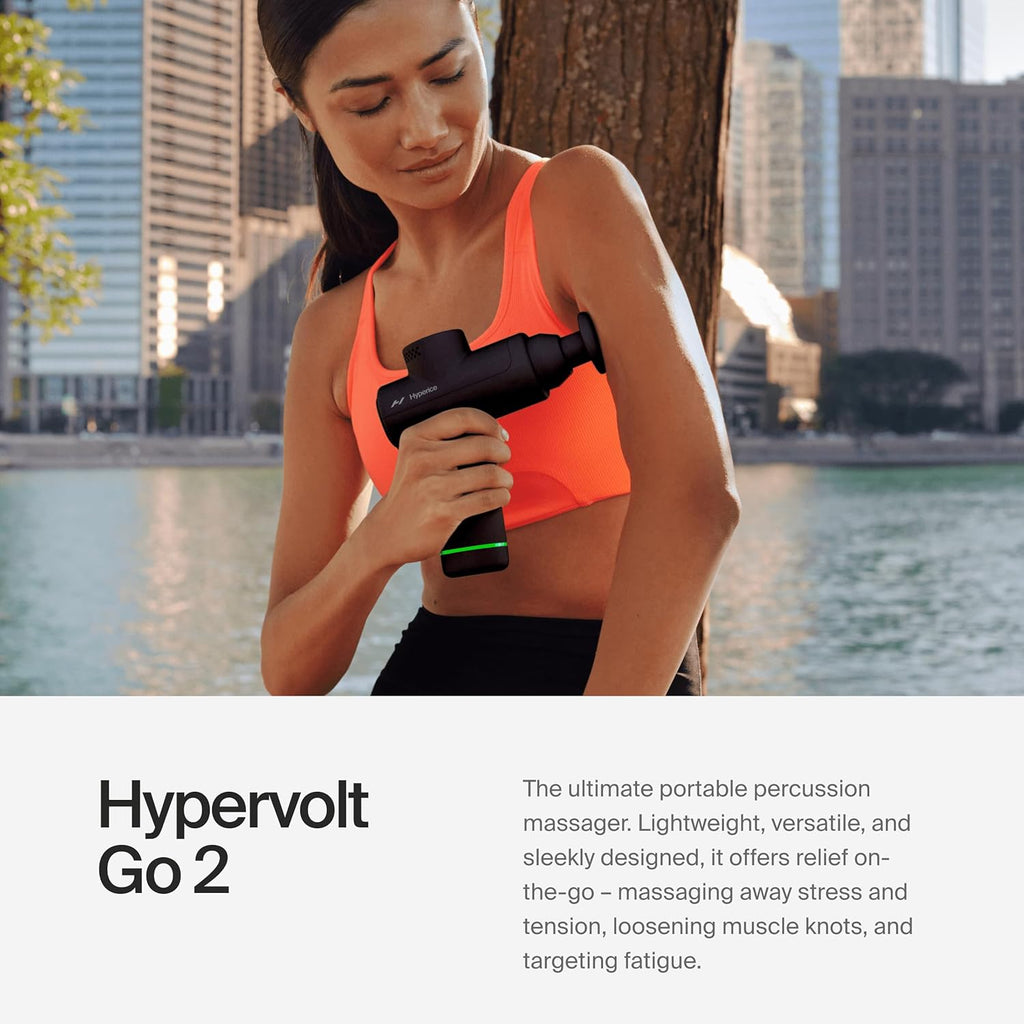 Hyperice Hypervolt Go 2 - Black - Featuring Quiet Glide Technology - Handheld Percussion Massage Gun - 3 Speeds, 2 Interchangeable Heads - Helps Relieve Sore Muscles and Stiffness - The Cozy Corner